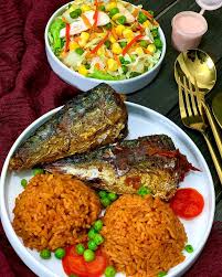 Jollof Rice, salad, and Titus Fish 